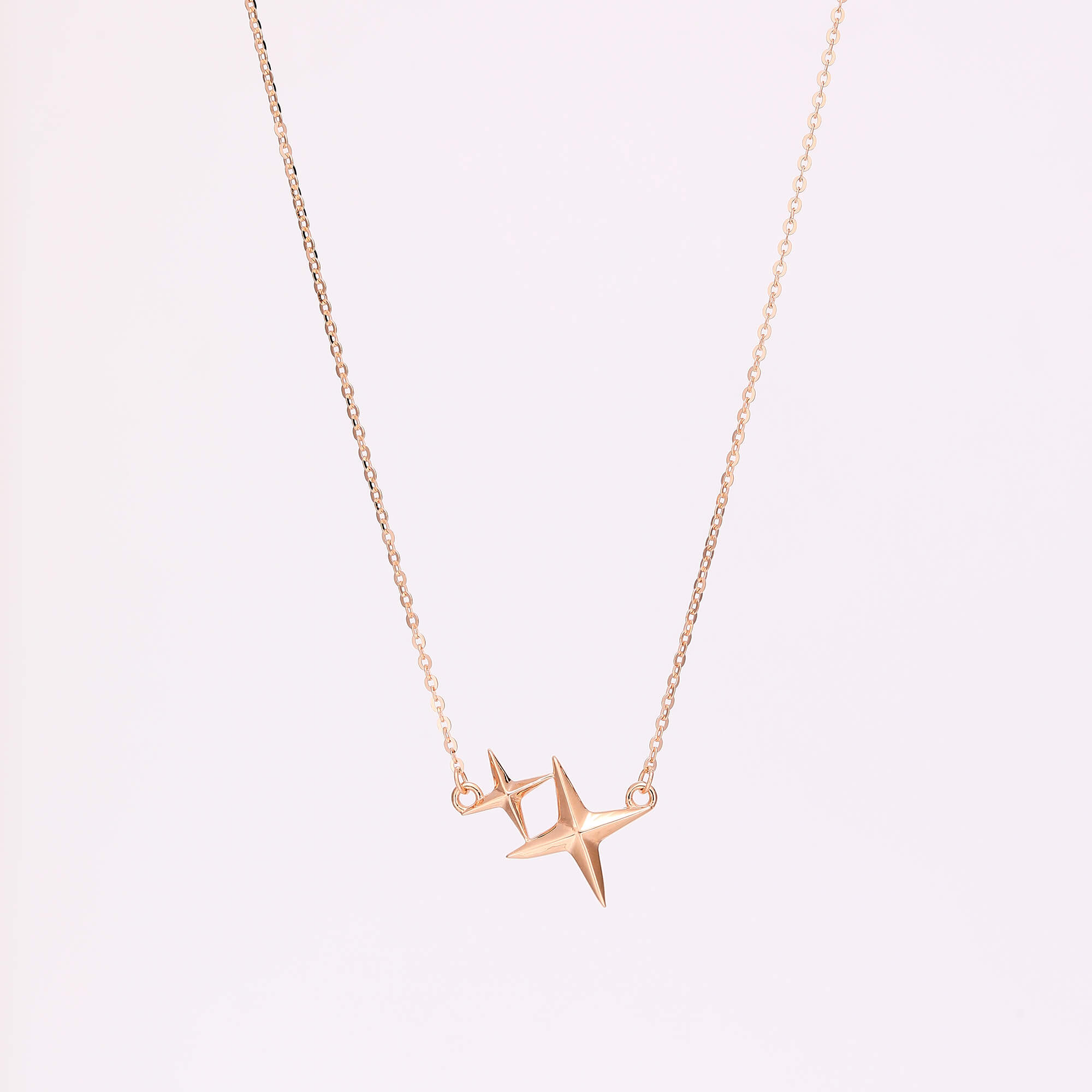 Stellar Glow · Four-Point Starburst K Gold Necklace